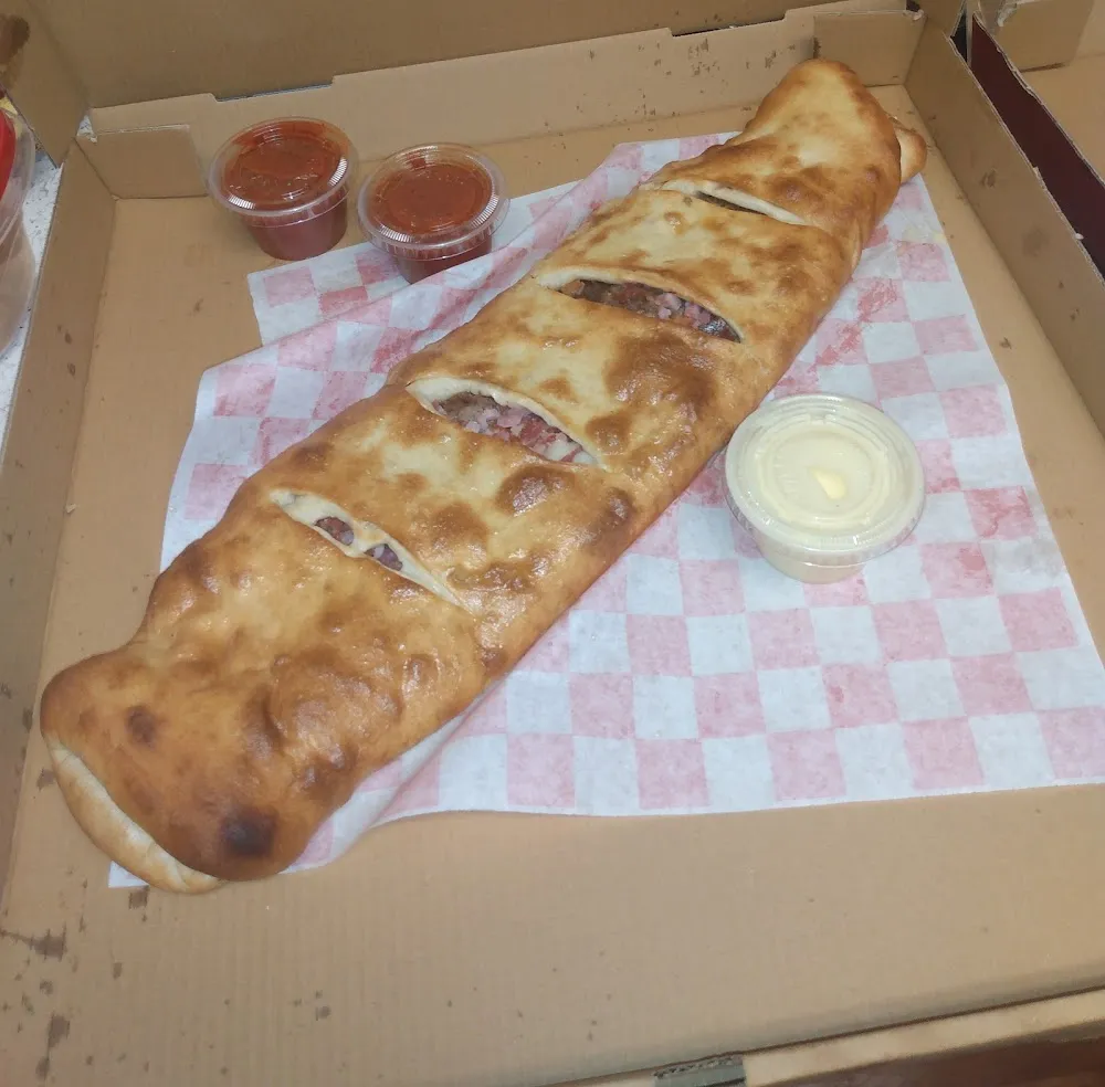 The God Father Large Stromboli Made by the Owner Himself It's a Work of Art
